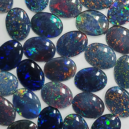 13118.0 - 16x12 mm Oval Shaped Australian Opal Triplet Made from Natural Australian Opal for sale in Wholesale Quantity at Wholesale Prices