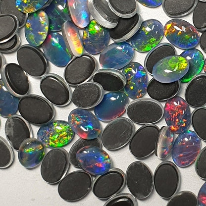 13015.0 - 7x5 mm Oval Cut Australian Opal Triplets Made from Natural Australian Opal for sale in Wholesale quantities at Wholesale prices