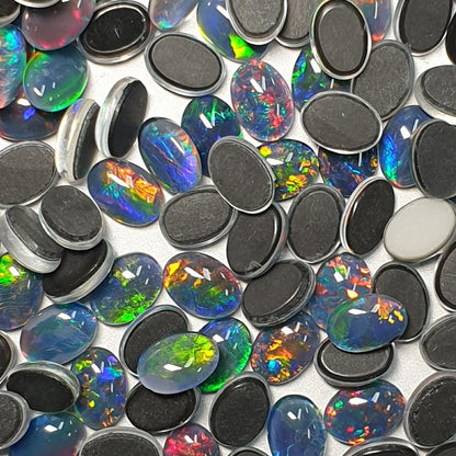 13015.0 - 7x5 mm Oval Cut Australian Opal Triplets Made from Natural Australian Opal for sale in Wholesale quantities at Wholesale prices
