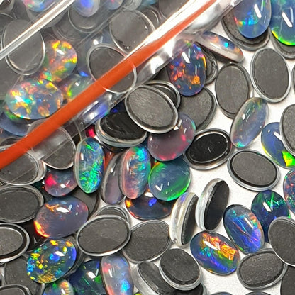 13015.0 - 7x5 mm Oval Cut Australian Opal Triplets Made from Natural Australian Opal for sale in Wholesale quantities at Wholesale prices
