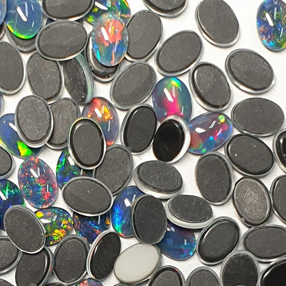 13015.0 - 7x5 mm Oval Cut Australian Opal Triplets Made from Natural Australian Opal for sale in Wholesale quantities at Wholesale prices