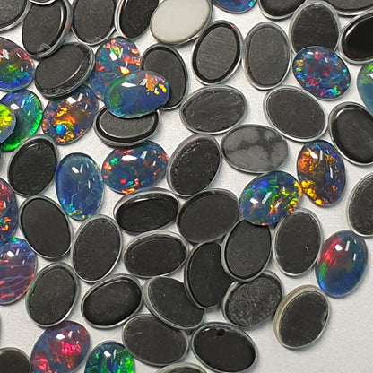 13015.0 - 7x5 mm Oval Cut Australian Opal Triplets Made from Natural Australian Opal for sale in Wholesale quantities at Wholesale prices