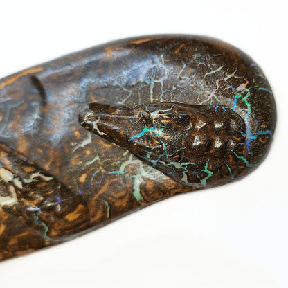 04938.0 - Boulder Opal Carving One pen desk set with two crocodiles on the river bank Opal runs throughout the whole piece