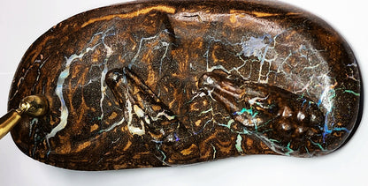 04938.0 - Boulder Opal Carving One pen desk set with two crocodiles on the river bank Opal runs throughout the whole piece