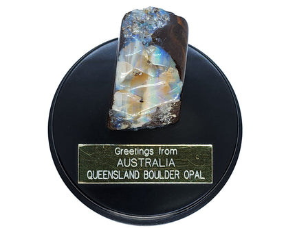 11690.1 - Boulder Opal "Monolith" Mounted on round black woden base with Gold plated engraved plaque and shipping/presentation boxs for sale