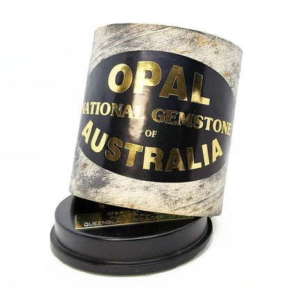 11690.1 - Boulder Opal "Monolith" Mounted on round black woden base with Gold plated engraved plaque and shipping/presentation boxs for sale