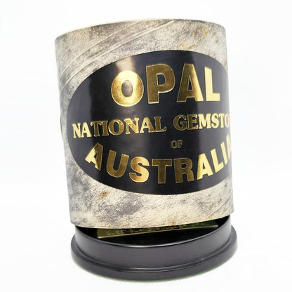 11690.1 - Boulder Opal "Monolith" Mounted on round black woden base with Gold plated engraved plaque and shipping/presentation boxs for sale