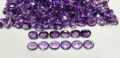 15367.0 - 9x7 mm Oval Cut Medium to Deep Purple Amethyst for sale in Wholesale quantities and at Wholesale prices