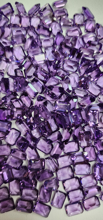 15366.0 -7 x 5 mm Emerald Cut Amethyst in wholesale quantity and at wholesale prices
