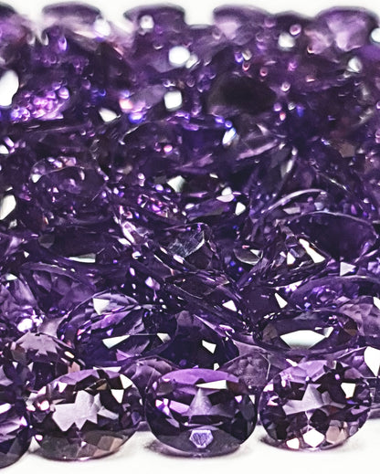 15367.0 - 9x7 mm Oval Cut Medium to Deep Purple Amethyst for sale in Wholesale quantities and at Wholesale prices