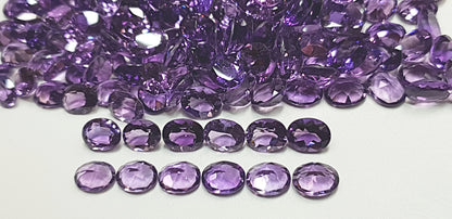 15367.0 - 9x7 mm Oval Cut Medium to Deep Purple Amethyst for sale in Wholesale quantities and at Wholesale prices