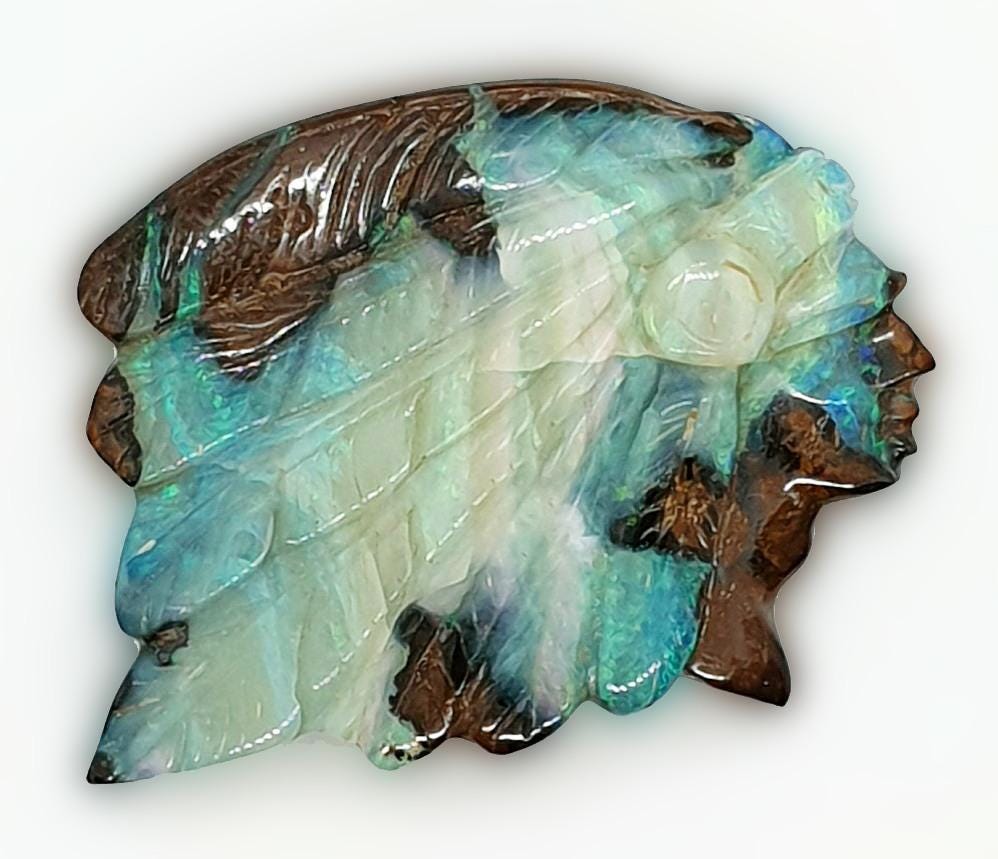 52135.2 - Head of Amerindian Wearing Ceremonial Head Gear Carved in Boulder Opal Great for bola slide, Bola slide, Opal tie bar, Opal brooch