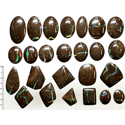 54157.0 - 25 piece lot of rare 1970's Superbly polished Australian Boulder Opal Sizes from 13x10 mm to 25x15 mm 3.0 - 3.5mm thick Flat backs