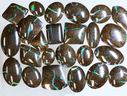 54157.0 - 25 piece lot of rare 1970's Superbly polished Australian Boulder Opal Sizes from 13x10 mm to 25x15 mm 3.0 - 3.5mm thick Flat backs