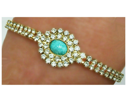 53644.0 - Very Rare 8 x 6 mm Oval Cut Australian Natural Untreated Turquoise set in 18 cm Gold Plated Bracelet with Swarovski Rhinestones
