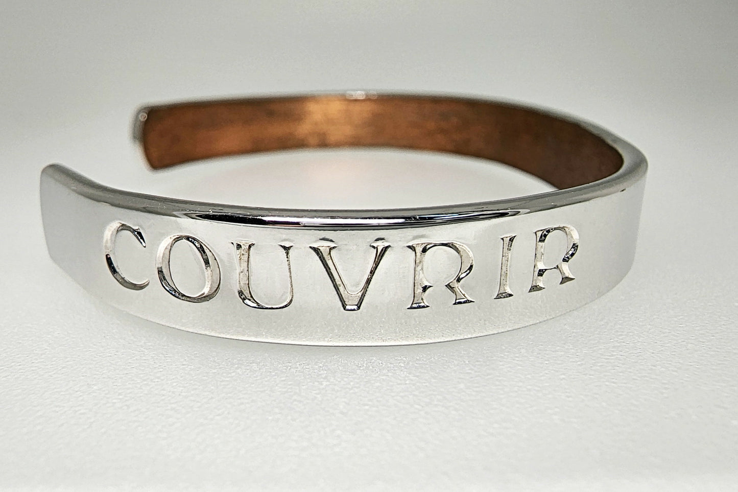 53661.0 - "COUVRIR" Copper Bangle with Rhodium Plated outside giving a Clean and Elegant Appearance and suitable for wearing anywhere at all