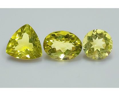 53950.0 - Three Lemon Quartz One Round Cut 11.8 mm 5.86cts One Triliant Cut 13.8 mm 7.61cts One Checker Board Cut Oval 12.5 x 11.5 x 9.2 mm