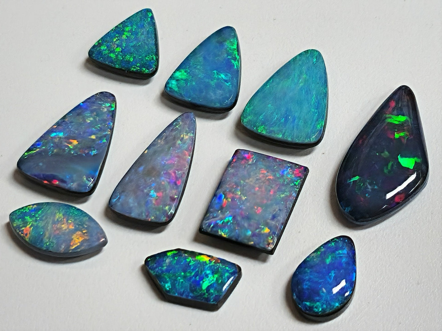 54073.0 - Unusual shaped Opal Doublets Made in Australia from Natural Australian Opal Lot A is 7 pcs 32.29 cts, Lot B is 10 pcs 26.98 cts