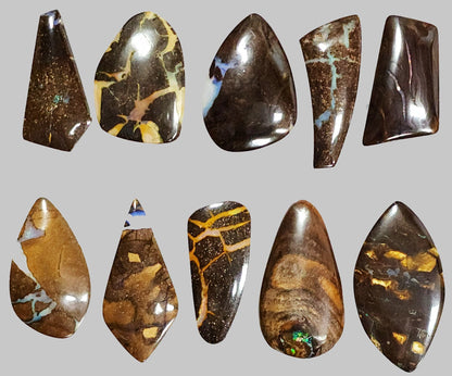 54103.0 - Australian Queensland Boulder Opal Free shaped cut 30 pieces Large stones 20 - 40mm long x 15 - 30mm wide 839.4 cts Select pieces