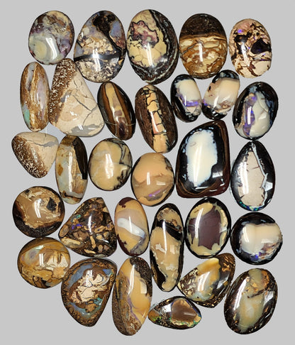 54104.0 - Oval and free cut Australian Queensland Boulder Opal cabochons 30 pieces 293.60 cts From 15 to 20 mm long and from 10 - 17 mm wide