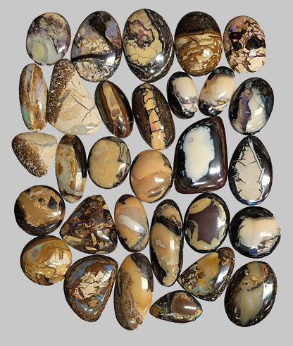 54104.0 - Oval and free cut Australian Queensland Boulder Opal cabochons 30 pieces 293.60 cts From 15 to 20 mm long and from 10 - 17 mm wide