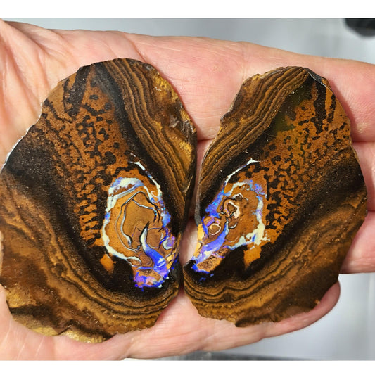 54105.0 - Twin slabs of matching Australian Queensland Boulder Opal 382.27 cts Each about 75 x 45 x 5 mm thick Photos under different lights