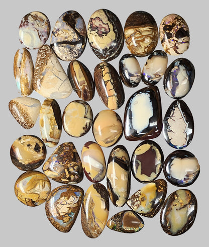 54104.0 - Oval and free cut Australian Queensland Boulder Opal cabochons 30 pieces 293.60 cts From 15 to 20 mm long and from 10 - 17 mm wide