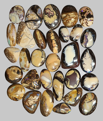 54104.0 - Oval and free cut Australian Queensland Boulder Opal cabochons 30 pieces 293.60 cts From 15 to 20 mm long and from 10 - 17 mm wide