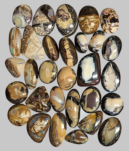 54104.0 - Oval and free cut Australian Queensland Boulder Opal cabochons 30 pieces 293.60 cts From 15 to 20 mm long and from 10 - 17 mm wide