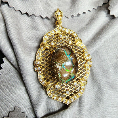 10052.0 - Sterling Silver Gold Plated Combination Penant or Brooch 60 x 35 mm set with 21 x 15 mm One Australian Boulder Opal and CZ