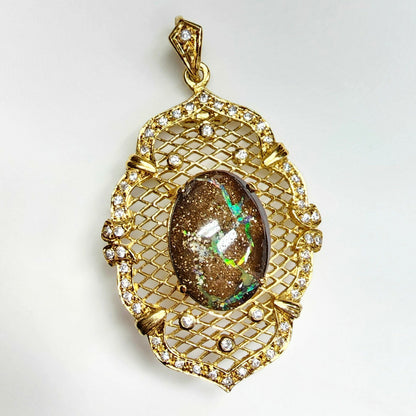 10052.0 - Sterling Silver Gold Plated Combination Penant or Brooch 60 x 35 mm set with 21 x 15 mm One Australian Boulder Opal and CZ