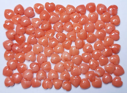 54076.0 - Natural Coral from Taiwan Sea 6 to 7 mm Heart Shape with Drilled Hole at top This is NOT fake or imitation Coral It's REAL Coral.