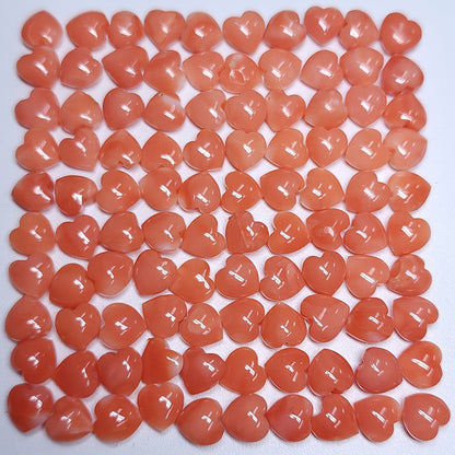 54076.0 - Natural Coral from Taiwan Sea 6 to 7 mm Heart Shape with Drilled Hole at top This is NOT fake or imitation Coral It's REAL Coral.