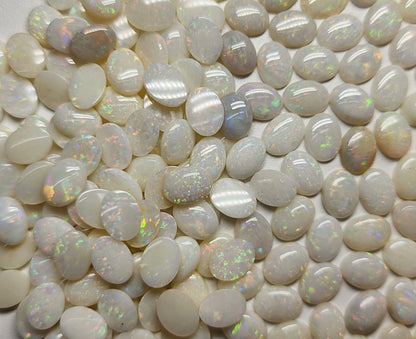 54021.0 - 8x6 mm Wholesale Australian Solid White Oval Cut Cabochon Opal from 1980s for sale All with colour From 1.5 mm to 3.0 mm thick