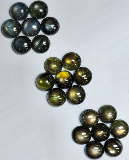 54146.0 - About 6 mm round cut Australian Star or sheeny Sapphires in MIXED colours including grayish, yellowish, brownish and blackish.