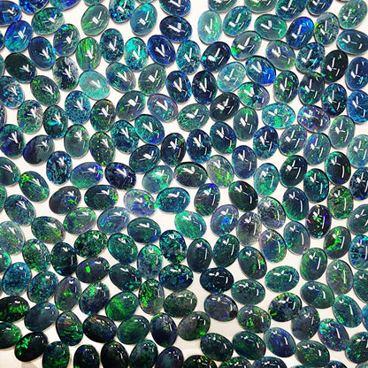 53946.0 - 8x6 mm Oval Cut Australian Opal Triplets For Sale in either Blue or Green or Red Colour or in a Combination of All Three Colours