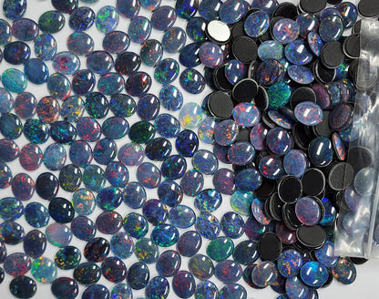 13068.0 - 12x10 mm Oval Cut Australian Opal Triplets Made from NATURAL Opal For Sale in Wholesale Quantities at Quantity Discounted Prices