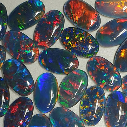 13075.0 - 13x8 mm Oval Shaped Opal Triplet Made from Natural Australian Opal for sale in Wholesale Quantities at Wholesale Prices