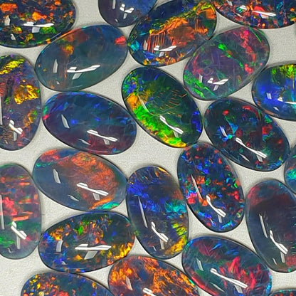 13075.0 - 13x8 mm Oval Shaped Opal Triplet Made from Natural Australian Opal for sale in Wholesale Quantities at Wholesale Prices