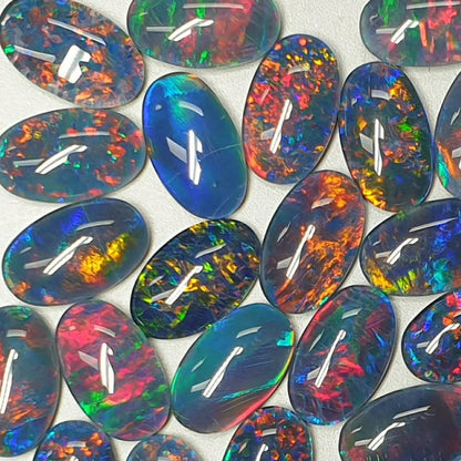 13075.0 - 13x8 mm Oval Shaped Opal Triplet Made from Natural Australian Opal for sale in Wholesale Quantities at Wholesale Prices