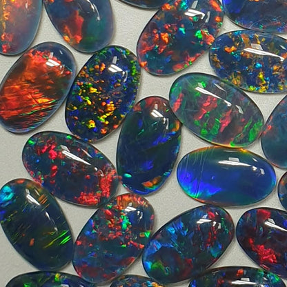 13075.0 - 13x8 mm Oval Shaped Opal Triplet Made from Natural Australian Opal for sale in Wholesale Quantities at Wholesale Prices