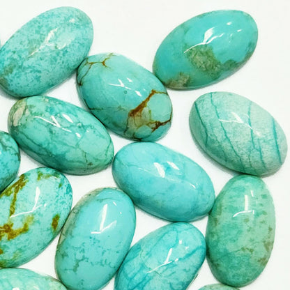 50010.6 - 10x6 mm Oval Cabochon Cut Natural Non-treated Australian Turquoise for sale in Varous Wholesale Quantities and Wholesale Prices