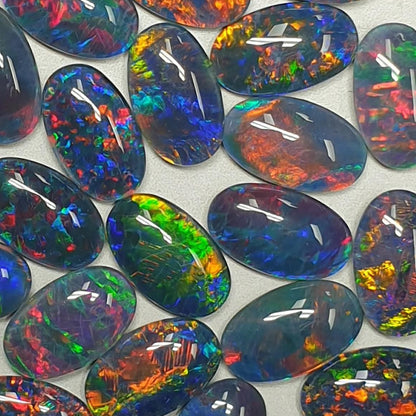 13075.0 - 13x8 mm Oval Shaped Opal Triplet Made from Natural Australian Opal for sale in Wholesale Quantities at Wholesale Prices