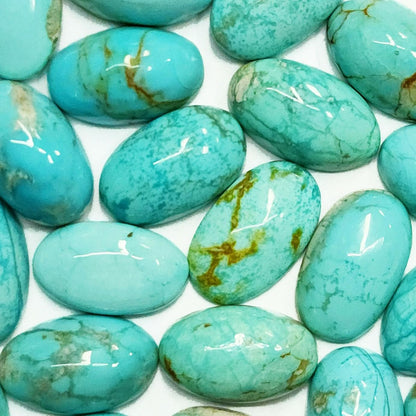 50010.6 - 10x6 mm Oval Cabochon Cut Natural Non-treated Australian Turquoise for sale in Varous Wholesale Quantities and Wholesale Prices
