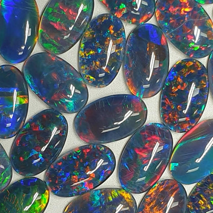 13075.0 - 13x8 mm Oval Shaped Opal Triplet Made from Natural Australian Opal for sale in Wholesale Quantities at Wholesale Prices