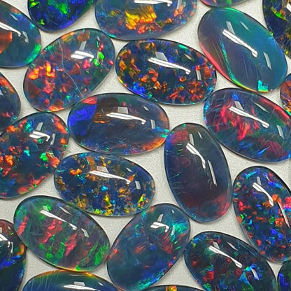 13075.0 - 13x8 mm Oval Shaped Opal Triplet Made from Natural Australian Opal for sale in Wholesale Quantities at Wholesale Prices