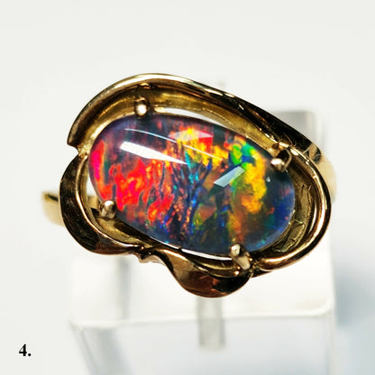 04749.0 - 14 Kt gult gullringsett med en 13 x 8 mm (0,51x0,32 tommer) australsk opaltriplett Totalvekt er omtrent 3,8 gr (19 cts)