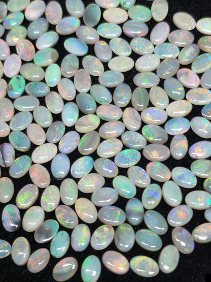 54067.0 - 6x4 mm Oval Cabochon Cut Natural Australian Solid Opal Whole parcel of 180 pieces weighing 49.53 carats or smaller lots for sale