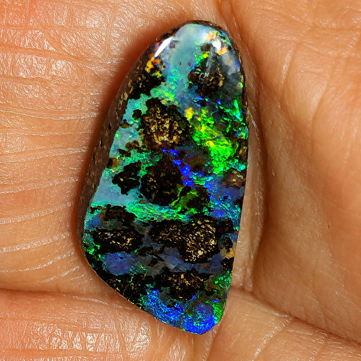 54530. Boulder Opal: Free Shape, 6 Carats