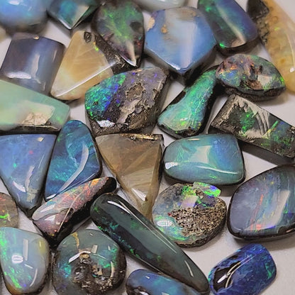 54156.0 - 50 Small Boulder Opal Free Cut Polished Faces 56.46 cts 6 - 14 mm High